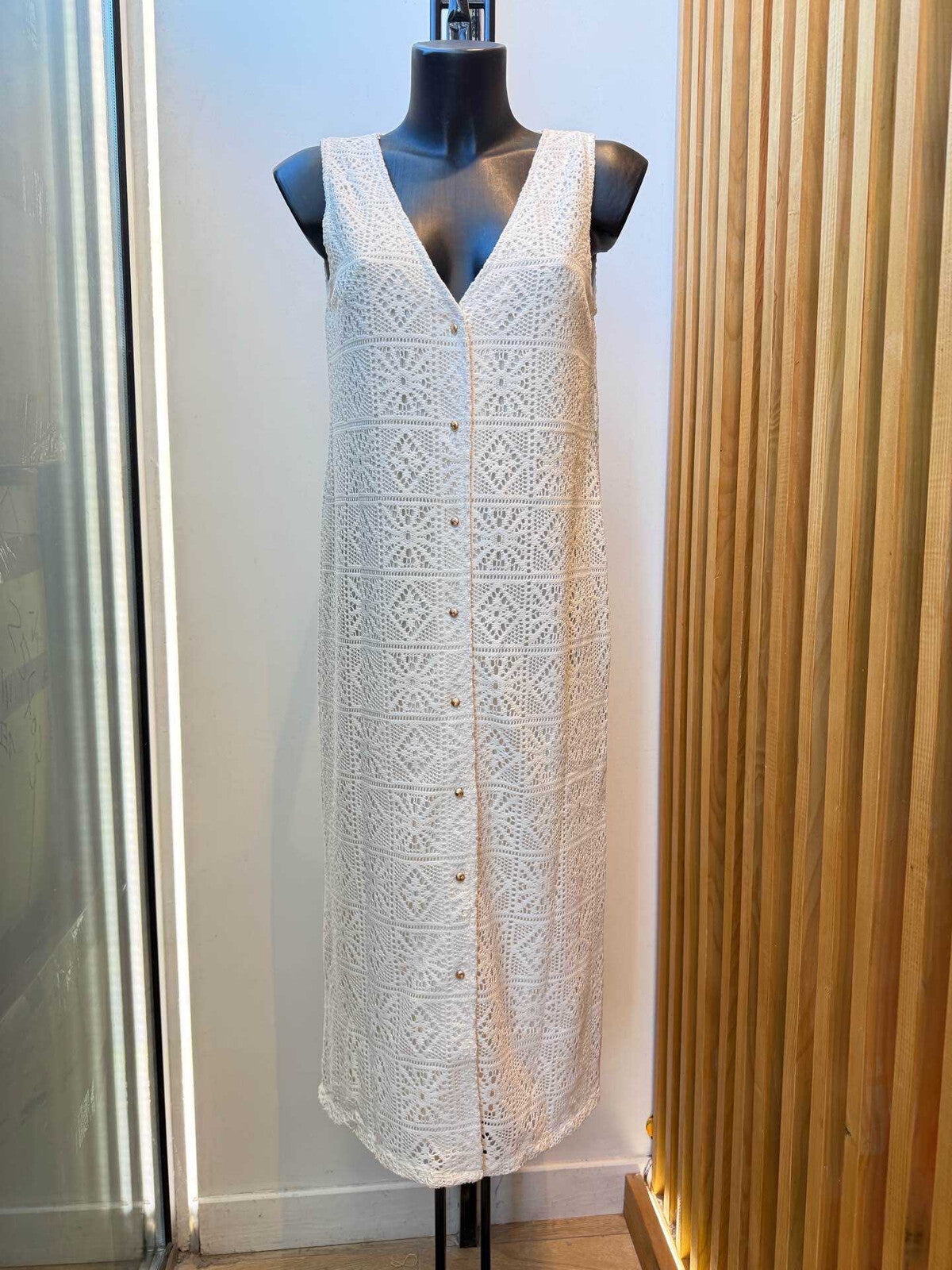 Witte jurk kanten afwerking