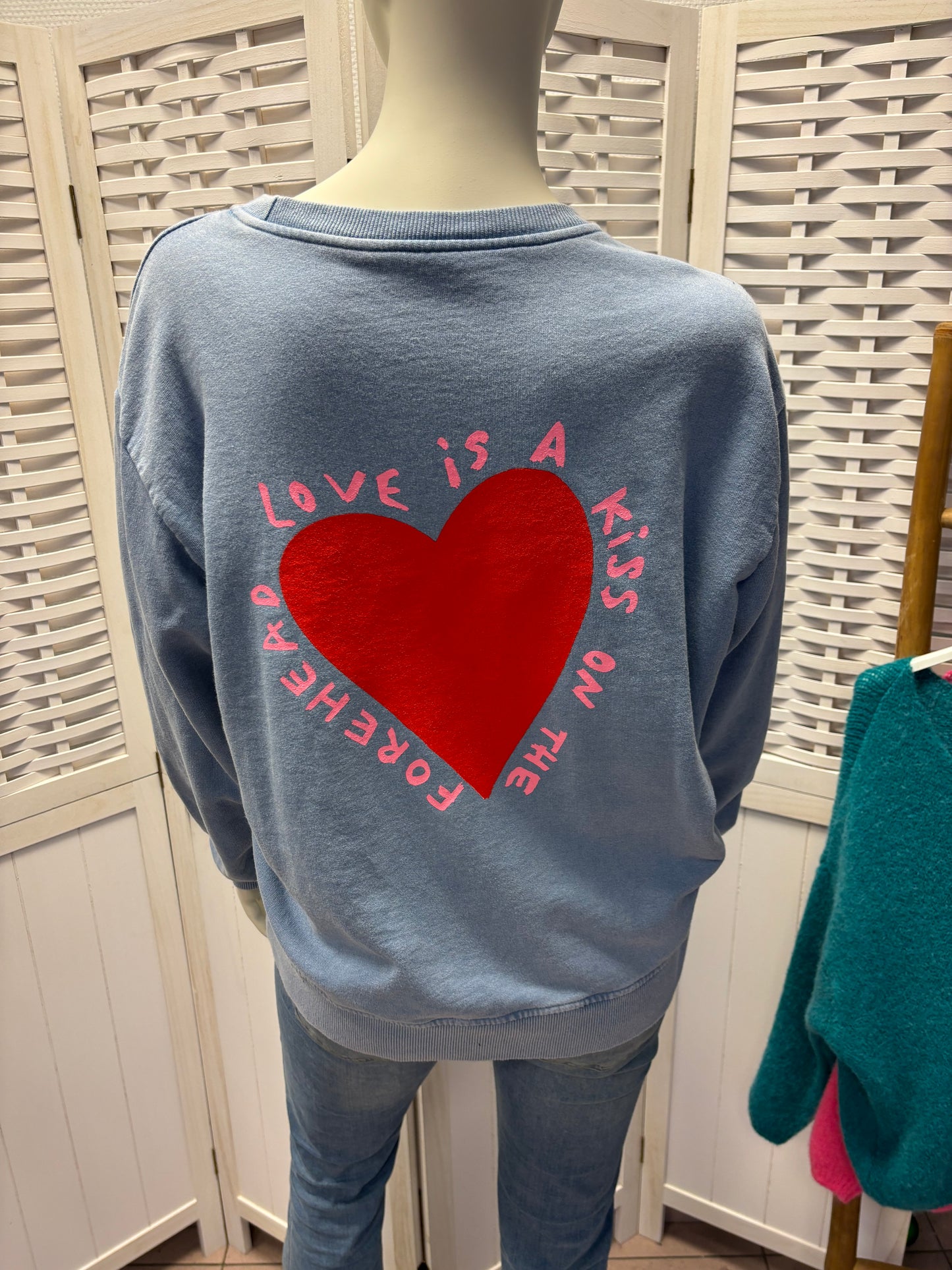 Sweater "Love is a kiss on the forehead"